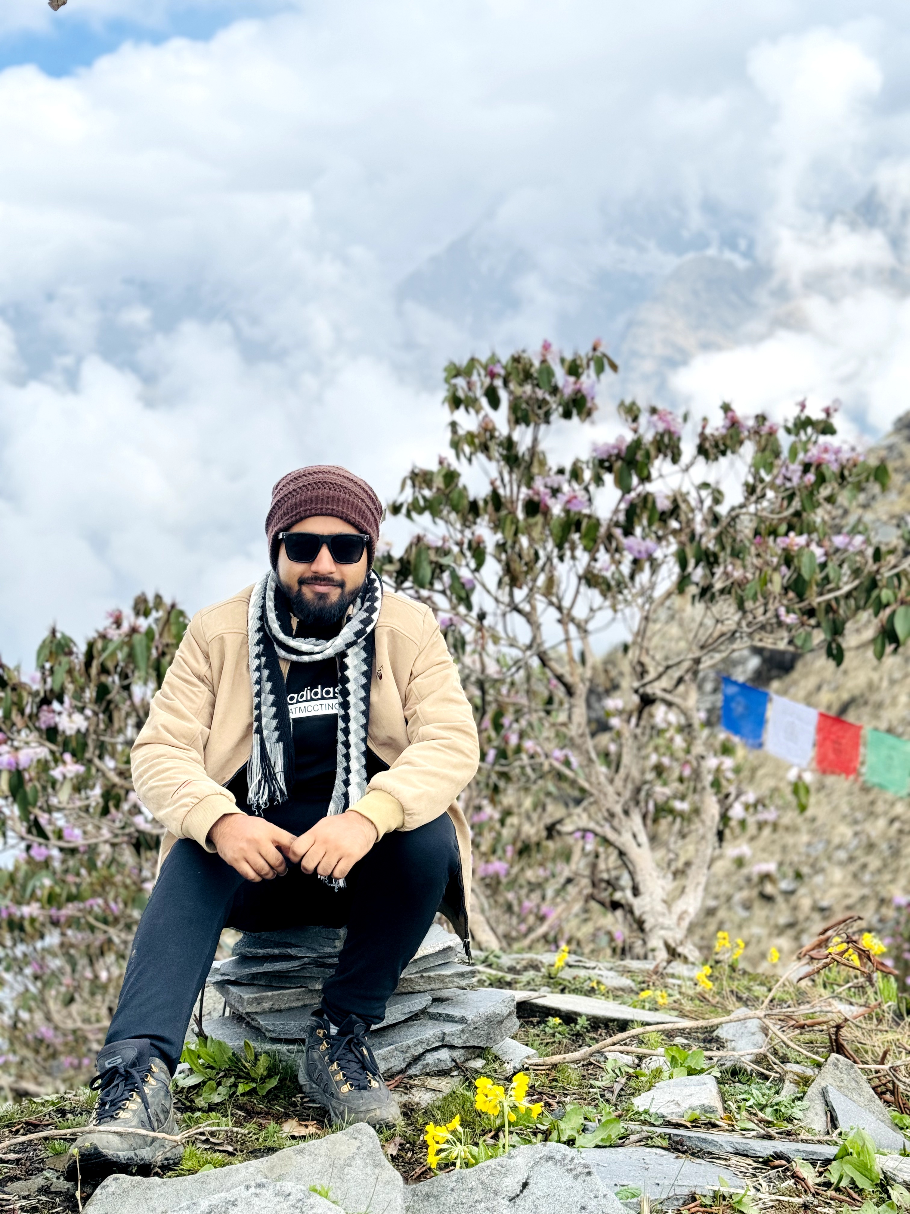 A man in a alice blue shirt with a thinking expression